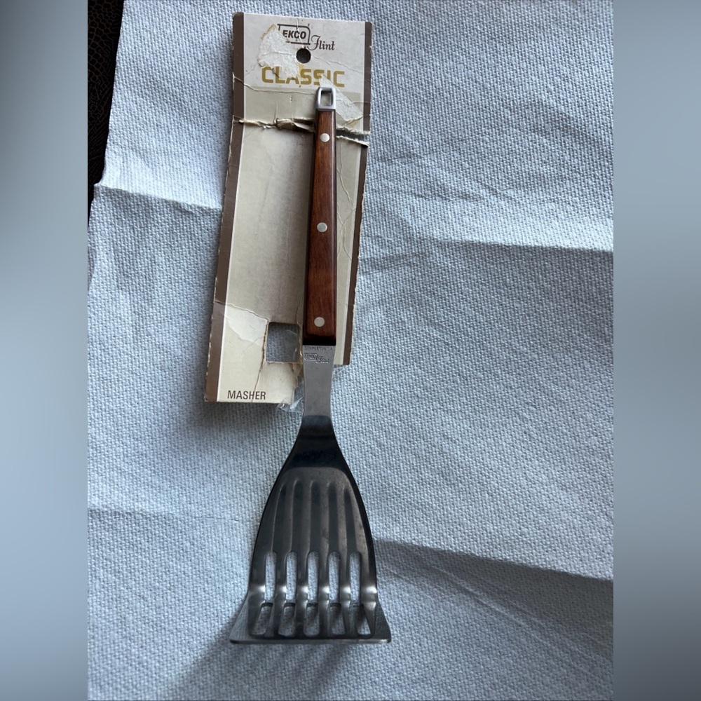 Ecko Unlimited Stainless Steel Masher with Brown Handle